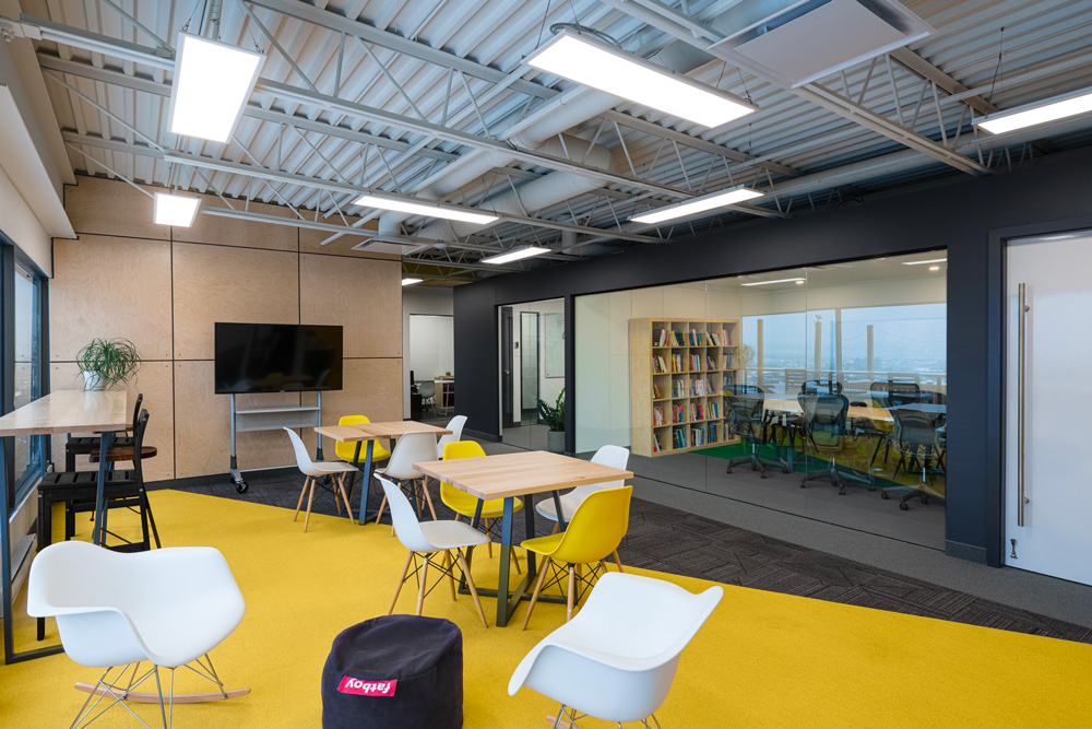 Designer d'intérieur - Design commercial : Aménagement d'une aire ouverte pour Groupe Dancause et associés